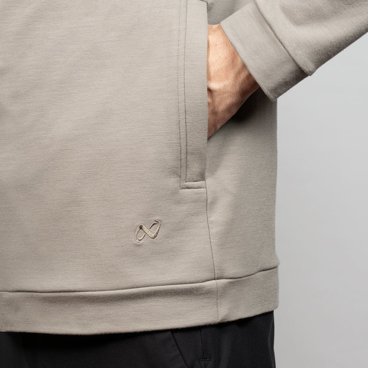 Nexural Premium Merino Zip Jacke Tasche Logo